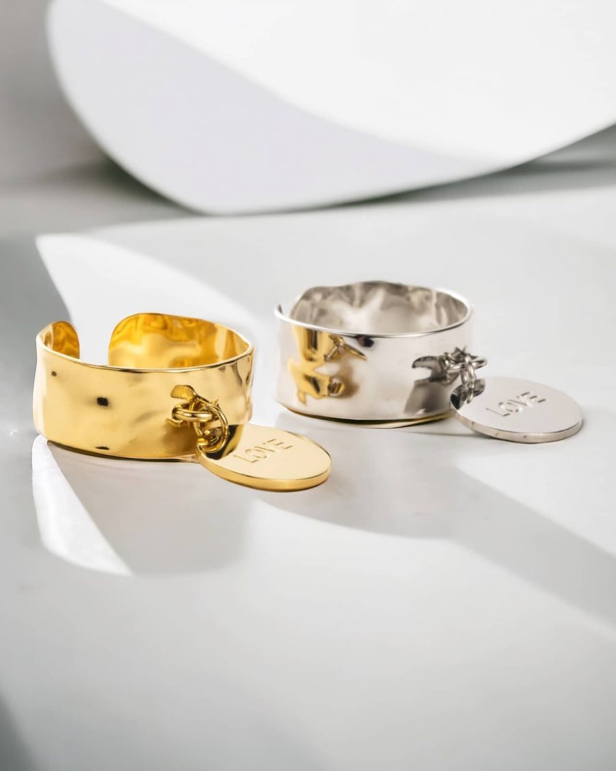 Bague breloque inscription Love l'une doré l'autre argenté, en acier inoxydable pour femme