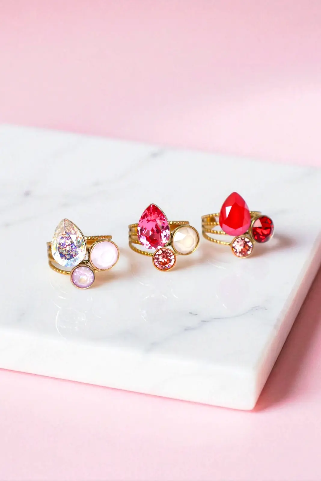 Trois bagues cristaux Swarovski Rose, rouge et original mauve clair