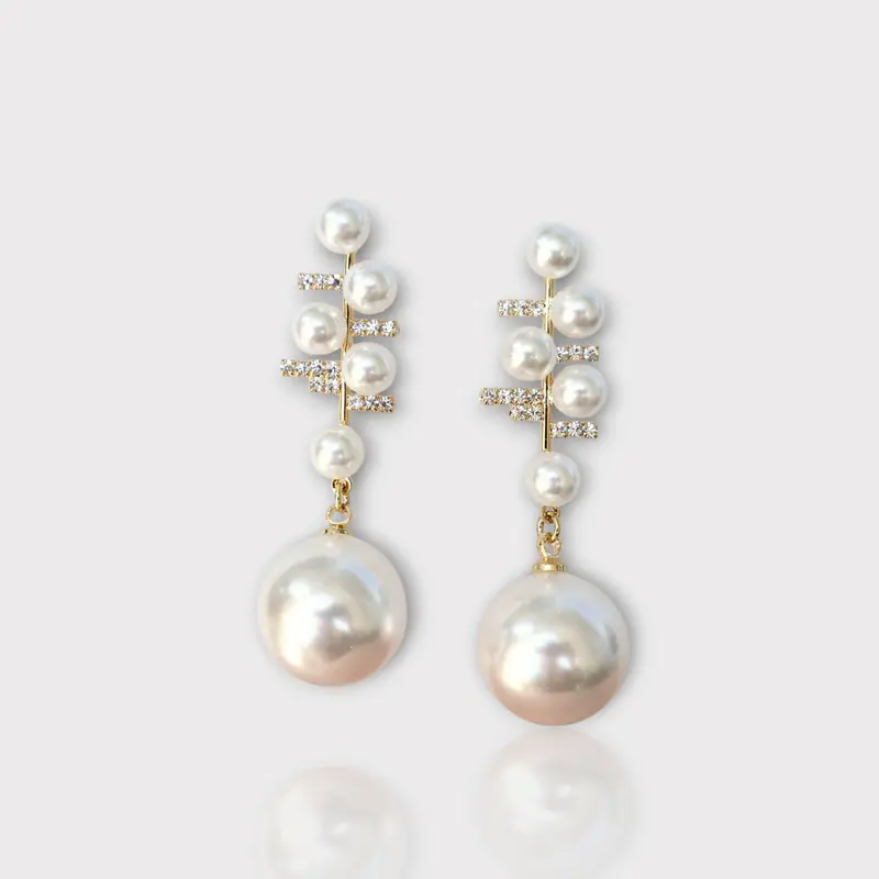 boucles d’oreilles pendantes perles blanches pour femme