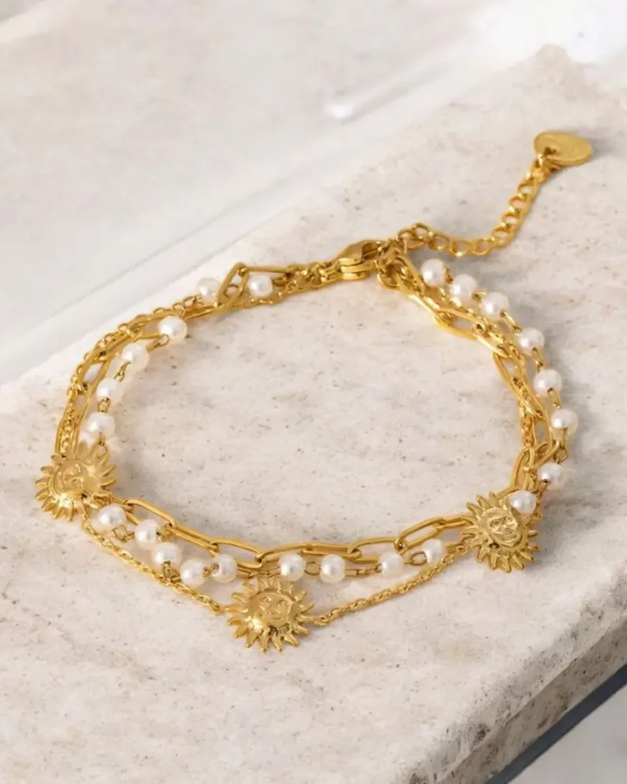 Bracelet avec soleil triple chaine doré